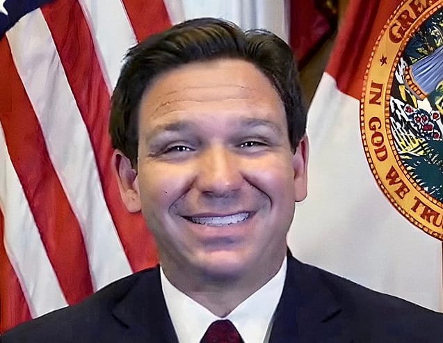 Picture of Florida Governor Ron DeSantis cropped from https://commons.wikimedia.org/wiki/File:Ron_DeSantis_on_Constitution_Day.jpg