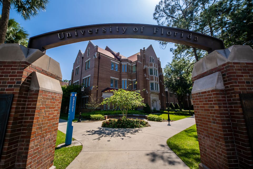 Picture the of entrance to the University of Florida at 13th St and University
